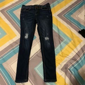 Dark blue ripped jeans